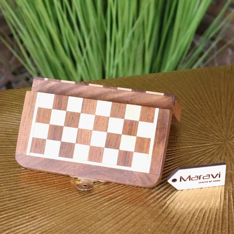 Shatranj folding wooden chess set 14cm with keyhole features a folding wooden chessboard in light and dark brown wood squares