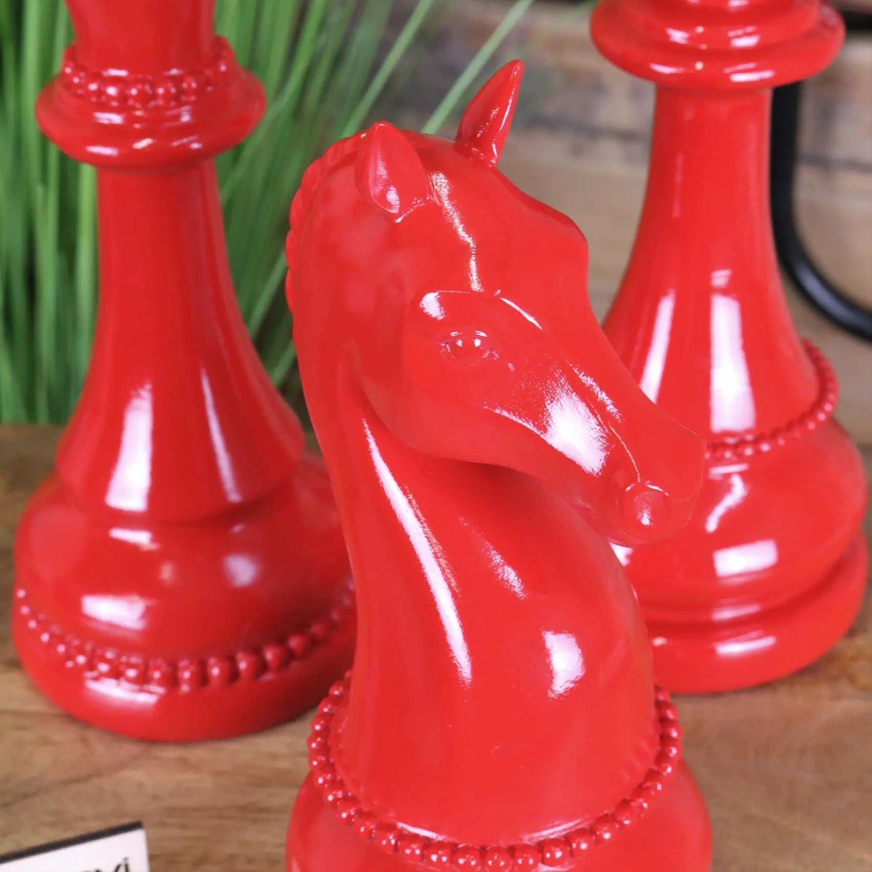 Vibrant red glossy ceramic large chess piece knight with beaded detailing from shatranj chess piece ornaments set