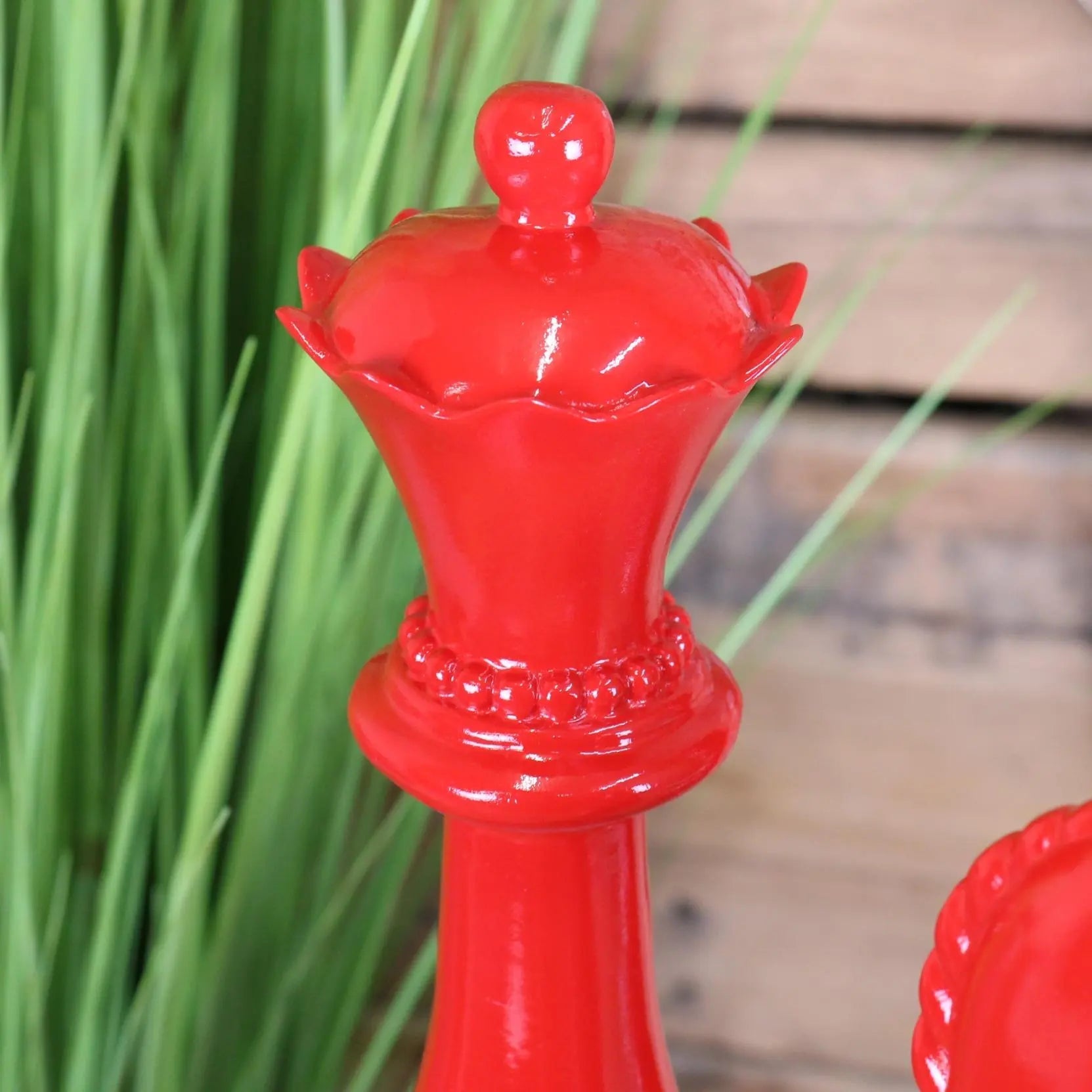 Vibrant red ceramic large chess piece queen with glossy finish and floral crown design from shatranj chess piece ornaments