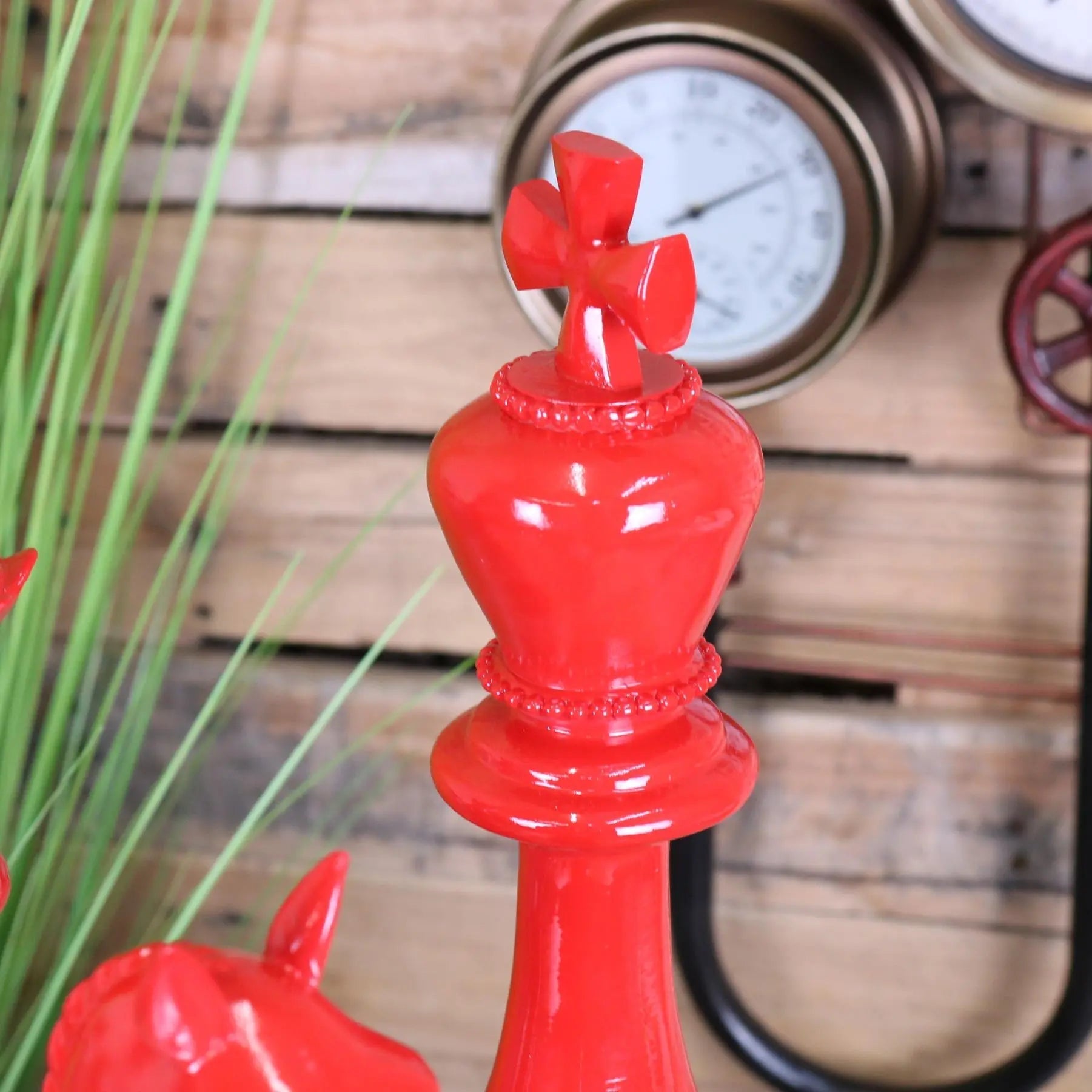 Vibrant red glossy large chess piece king with cross top and beaded detailing from shatranj chess piece ornaments set