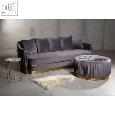 Purple velvet sofa with gold trim paired with shea grey footstool matching tufted grey footstool ottoman