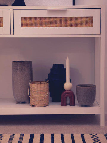 Sherman white wood and rattan two drawer console table with woven rattan accents on drawer console table