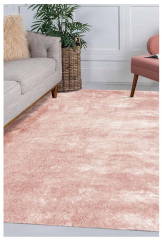 A soft plush pink supersoft shaggy rug with a subtle gradient effect called shimmer pink supersoft shaggy rug ods33