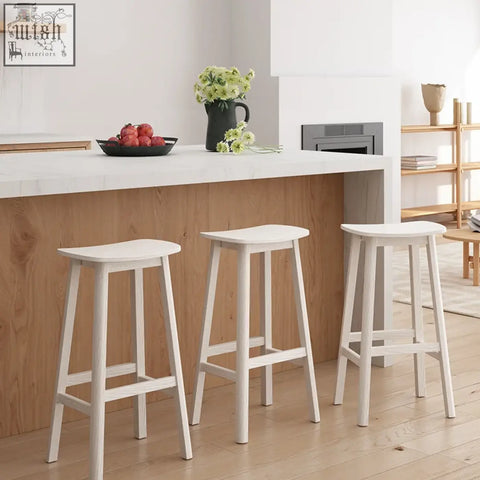 Three white wooden shina bar stools with minimalist design and clean lines perfect for any bar stool setup