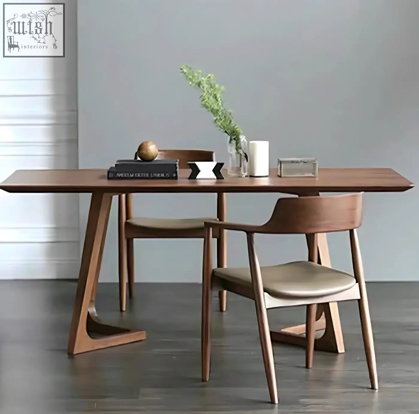 Modern walnut shoko dining table with sleek angular legs and smooth warm wood finish perfect for dining spaces