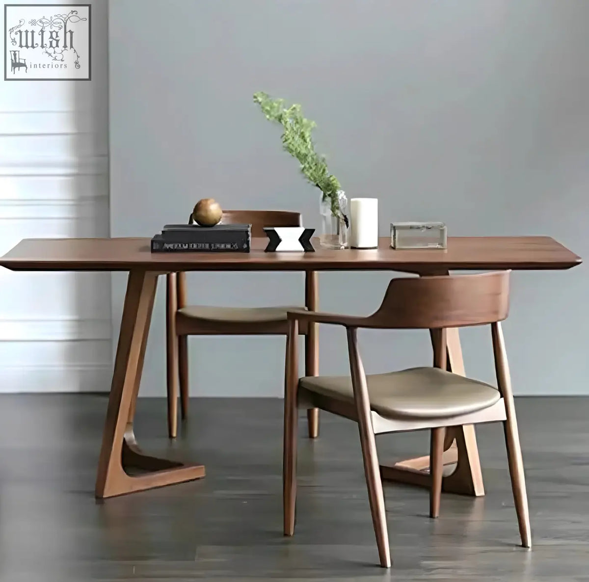 Modern walnut shoko dining table with sleek angular legs and smooth warm wood finish perfect for dining spaces
