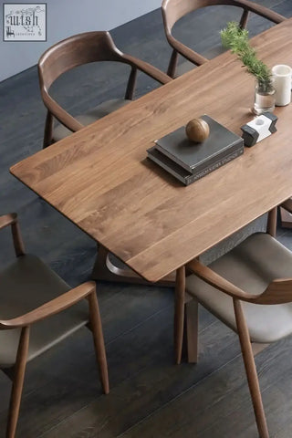 Modern walnut shoko dining table with sleek minimalist design and smooth wood grain finish perfect for dining areas