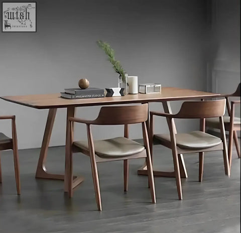 Modern wooden shoko dining table with light brown smooth finish and sleek angled legs for stylish dining spaces
