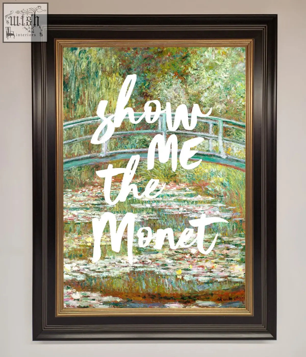 A monet framed poster with a water lily garden and arched bridge in a dark brown frame with gold inner border