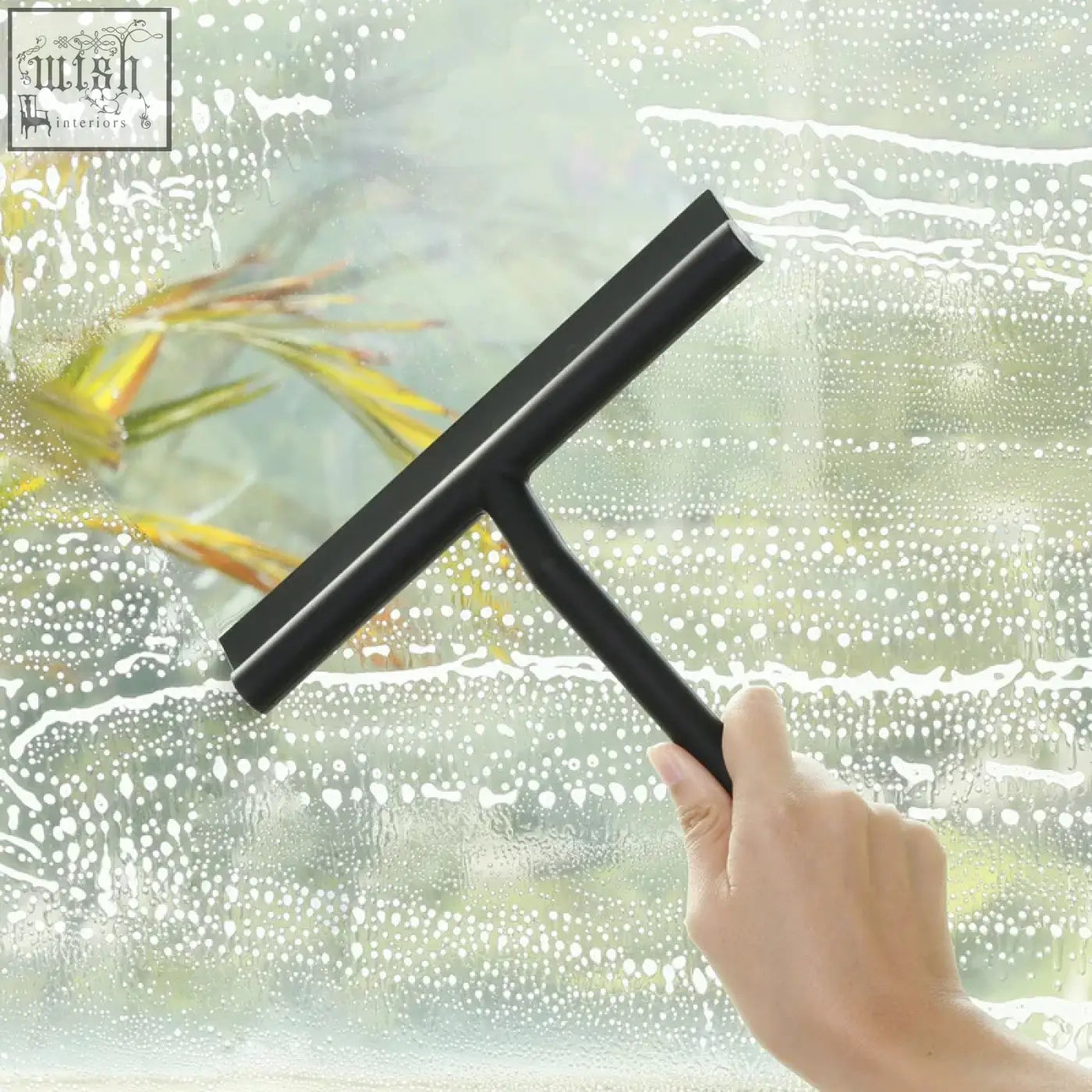 Black silicone shower squeegee with t-shaped handle wiping soap suds off window glass wiper for bathroom cleaning