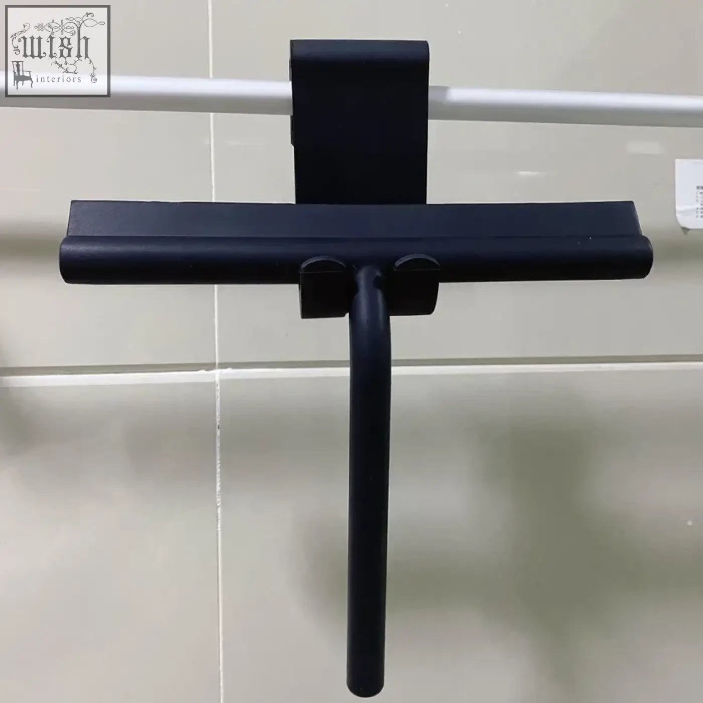 Black plastic shower squeegee with matte finish and ergonomic handle for window glass wiper and glass cleaning