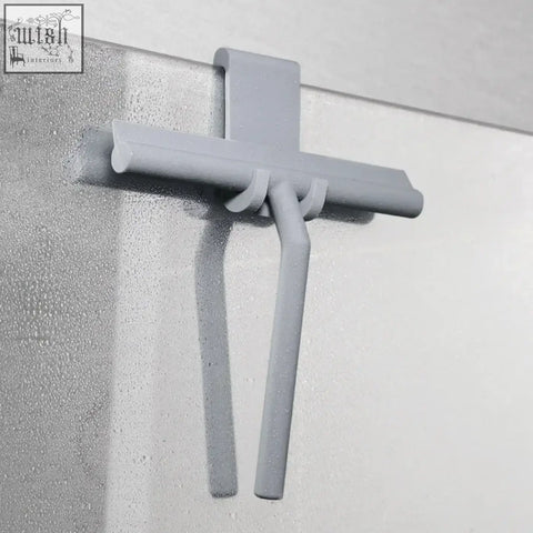 Gray plastic shower squeegee with cross handle and silicone arms for cleaning window glass and bathroom mirrors