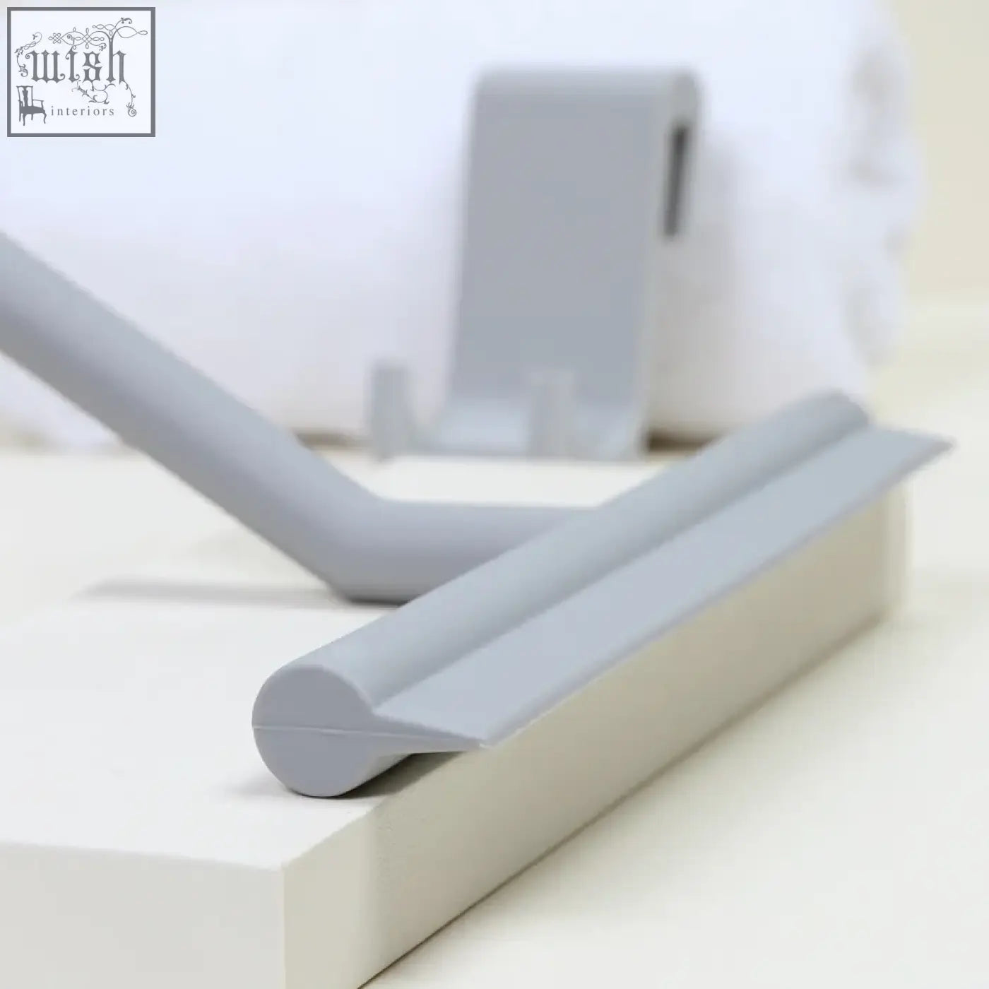 Gray silicone window glass wiper with sleek minimalist design and rounded edges for bathroom mirror cleaning