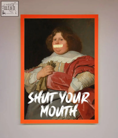 A framed print of a child in red velvet with a white lace collar and orange border featuring a mouth framed design