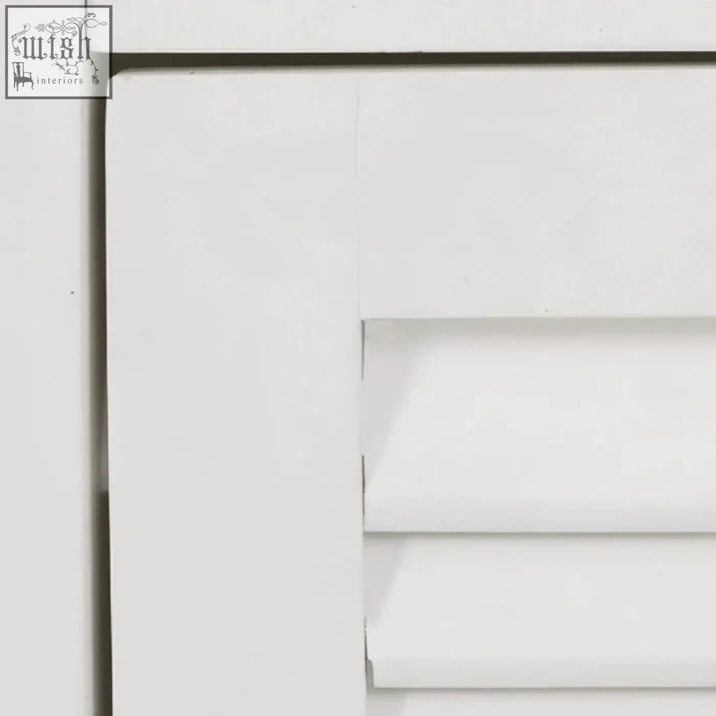 White painted wooden shutter with clean edges and horizontal slats for a white wood floor cabinet