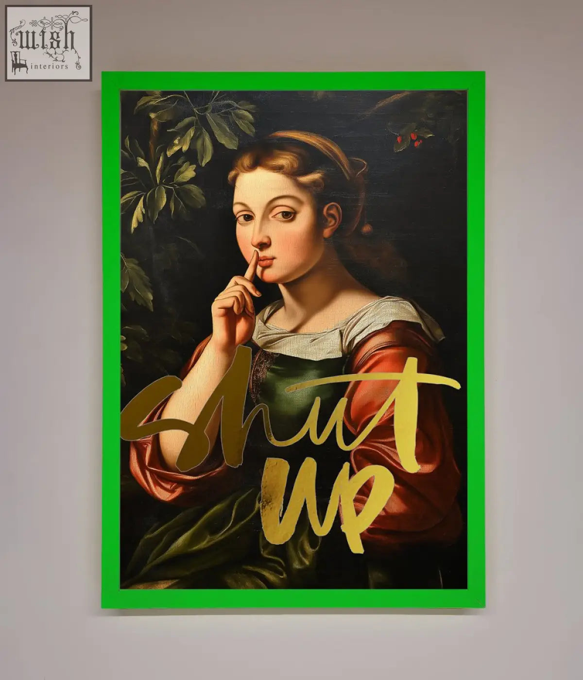 A vibrant green-framed shutup foil print featuring a classical woman in red and green with gold script text shut up