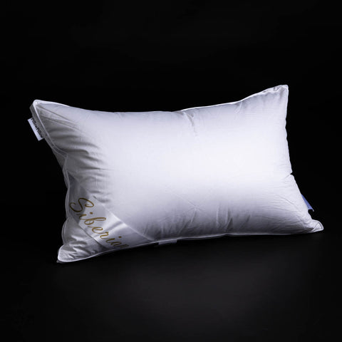 White rectangular pillow with siberian embroidered in gold script filled with siberian goose down