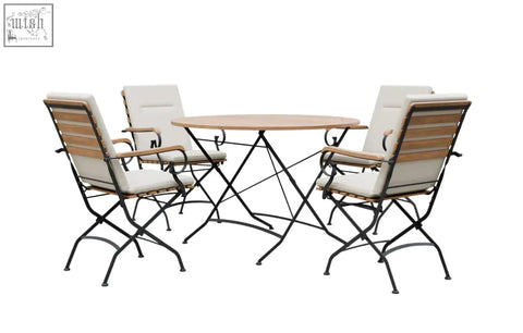 Black metal folding patio dining set with round grade ab teak top and matching chairs with white cushions