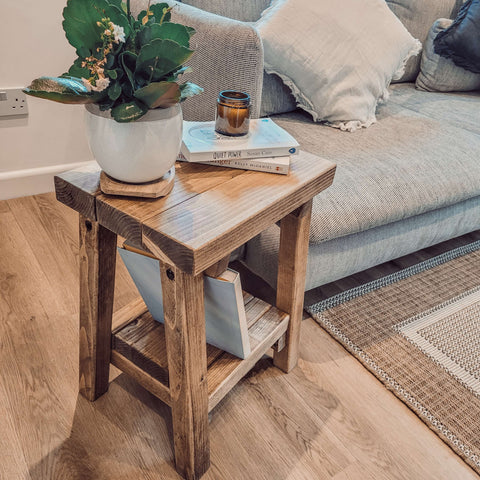 Rustic wooden siera side table with lower shelf and visible wood grain finish in natural brown color L40cm