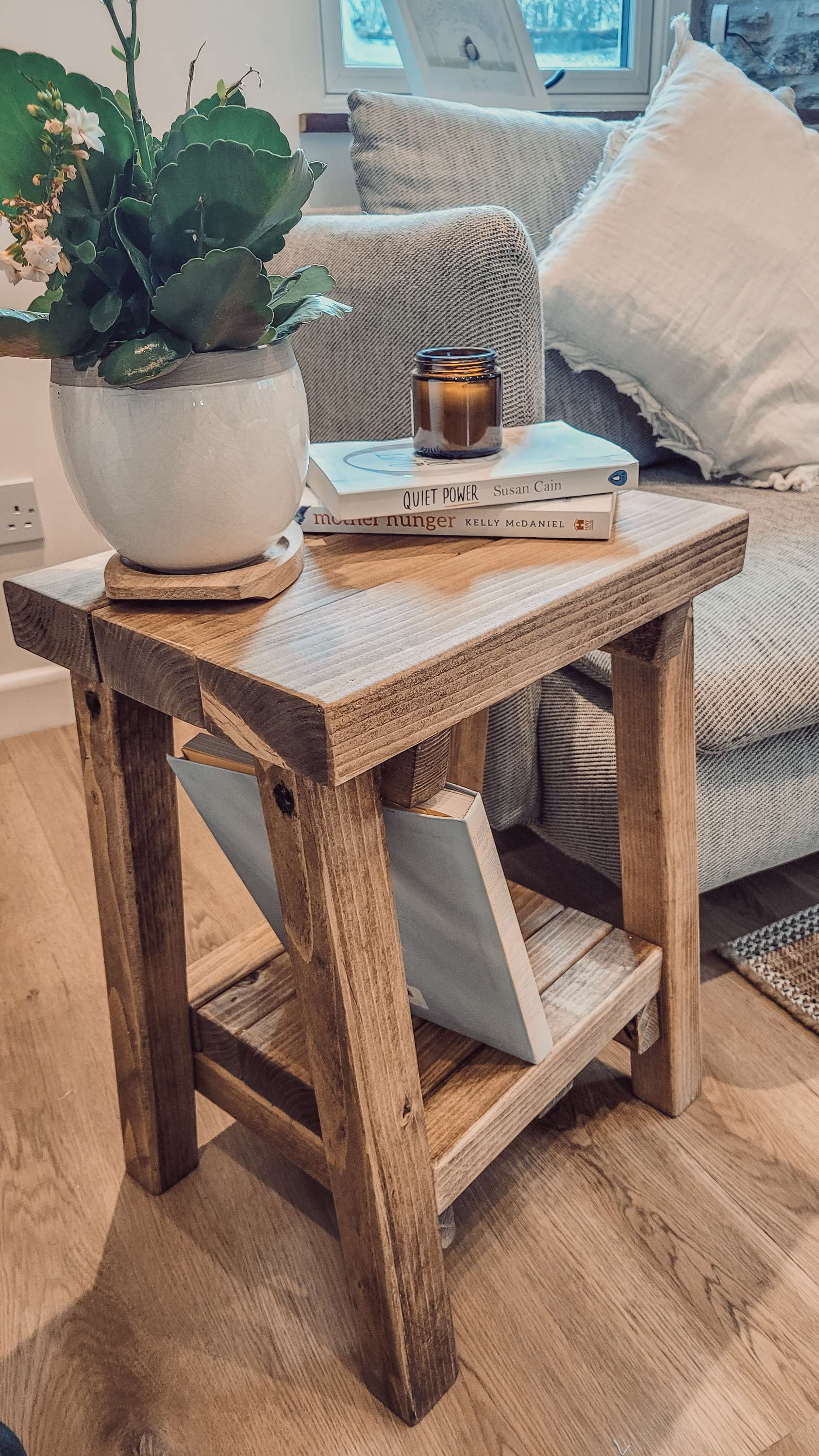Siera side table with storage in rustic wood finish featuring sturdy angled legs and weathered look