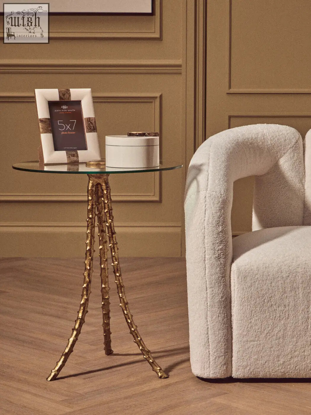 Sika large side table with warm gold golden bamboo-inspired triple-leg base and clear glass top for stylish living spaces
