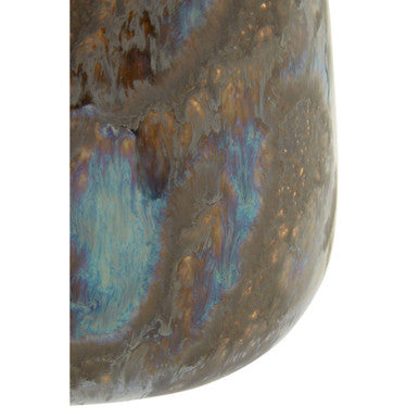 A ceramic silas brown planter with a glossy iridescent glaze in swirling blue brown and gold patterns