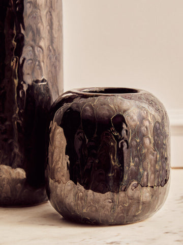 A glossy dark blue planter ceramic vase with a marbled surface and subtle gold accents called silas dark blue