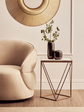 A sleek dark blue planter made of matte-finished ceramic with a tall slender form and subtle vertical ridges silas dark blue