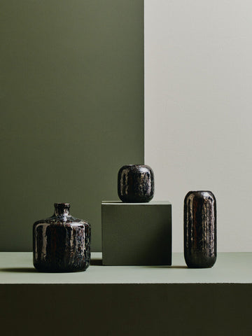 Three matte black ceramic vases with textured crackled glaze in silas dark blue planter design