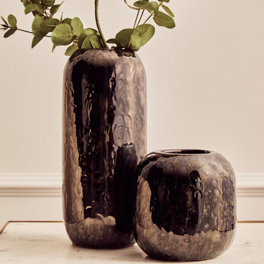 Two dark blue silas dark blue planters with a glossy hammered ceramic finish perfect for indoor plants