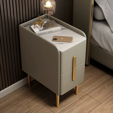 Modern gray Silva bedside table with marble top gold-tone legs and two drawers with sleek vertical handles