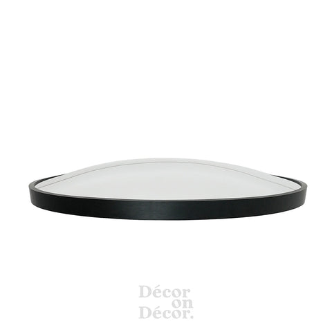 Black framed silver mirror with smooth reflective surface featuring interactive bubble design in oval shape