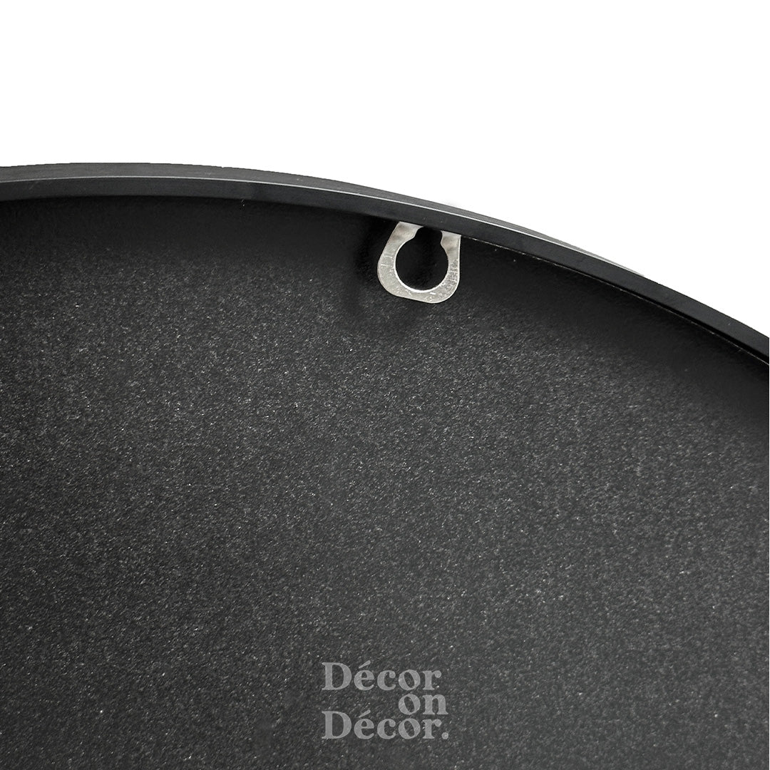 Black round wall mirror with silver hanging hook featuring a matte finish black frame interactive bubble design