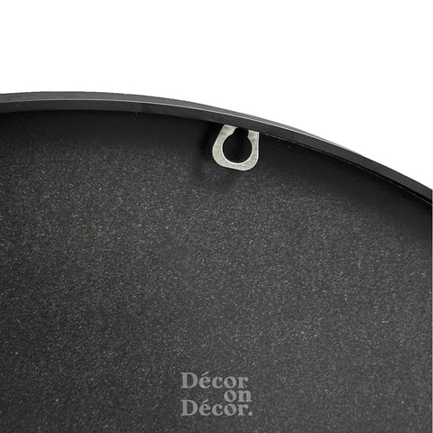 Black round wall mirror with silver hanging hook featuring a matte finish black frame interactive bubble design