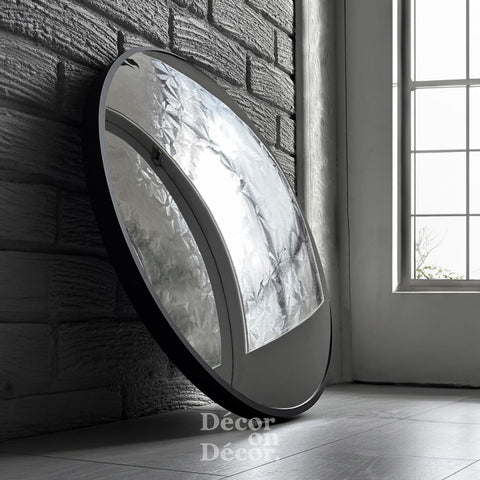 Silver bubble interactive mirror with black frame and crinkled silver mirror interior for stylish decor