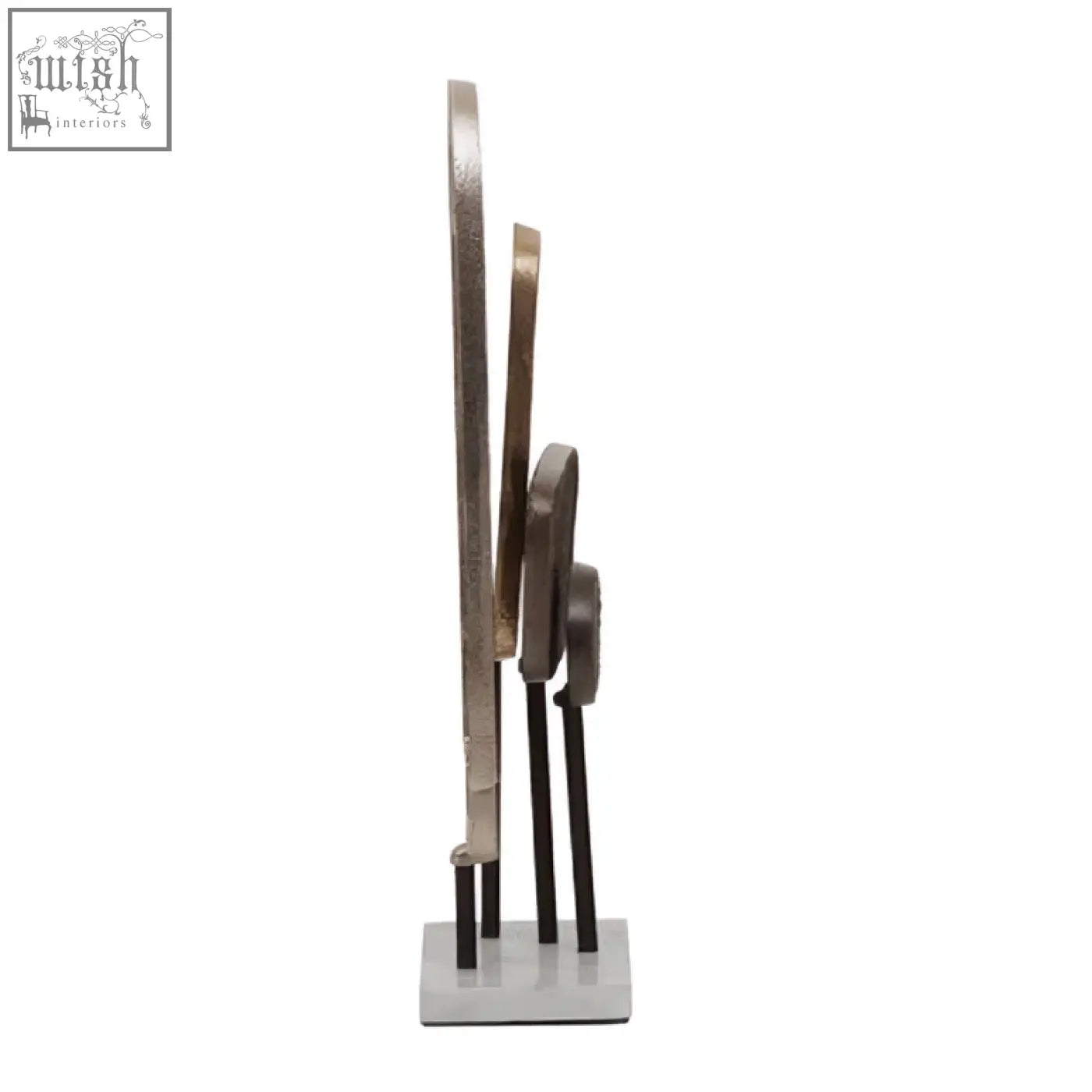 Modern abstract simbolo small assorted metal sculpture with silver gold and bronze rings on a white marble base