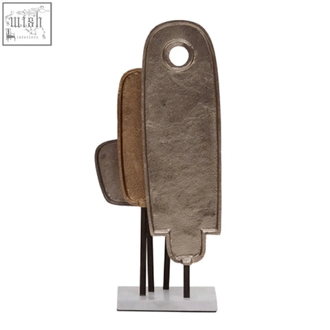Abstract metal sculpture in muted bronze and silver tones with marble base simbolo small assorted metal sculpture