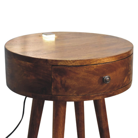 Round wooden single chestnut bedside table with drawer tapered legs warm brown finish and metallic knob
