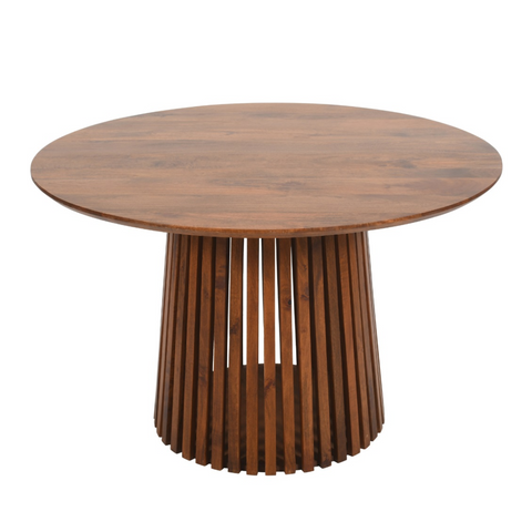 Round wooden dining table with smooth warm brown finish and vertical slat legs made from slatted mango wood