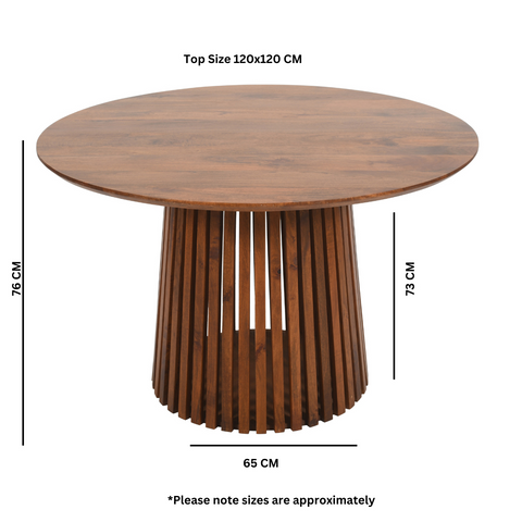 Round wooden dining table with smooth warm finish and vertical slat base in slatted mango wood for 4 to 6 seater