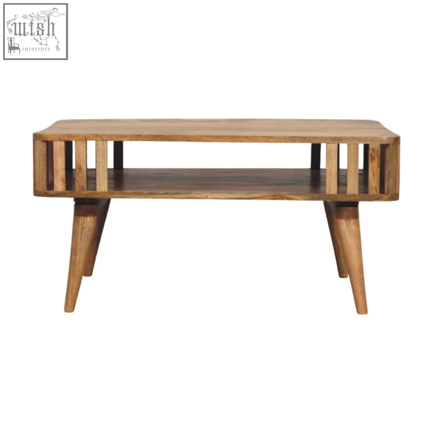 A rustic solid mango wood coffee table with vertical slats and angled legs in a warm oak-ish finish