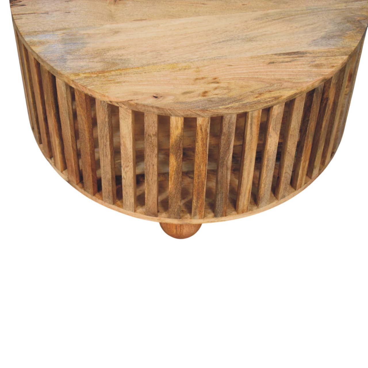 A rustic slatted round oak-ish coffee table made of solid mango wood with vertical slats and bun wooden feet