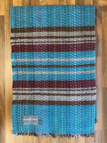 Small checked random recycled wool blanket with bold turquoise maroon gray stripes textured weave and fringed edges