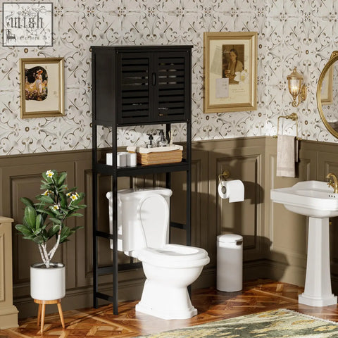 Black metal bathroom storage shelf with slatted cabinet doors and adjustable open shelves for freestanding toilet space