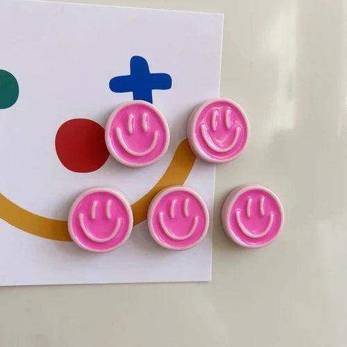 Pink smiley face glossy buttons with rounded edges from smiling glow fridge magnet pack for fridge decor and glow fridge magnet use