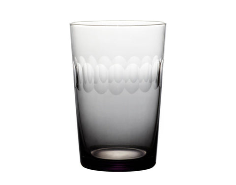 four smoky crystal tumblers with lens design