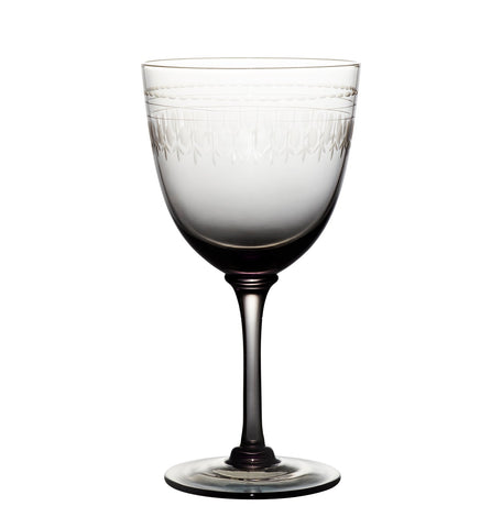 four smoky crystal wine glasses with ovals design