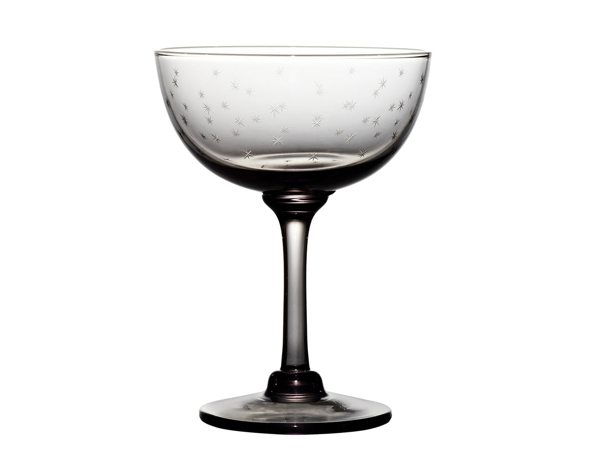 four smoky crystal champagne saucers with stars design