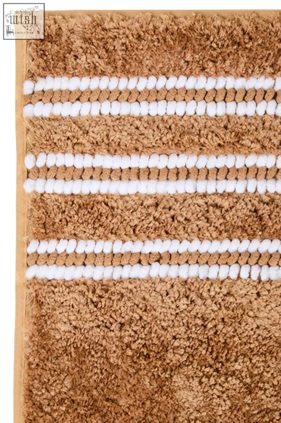 Tan soak large camel bath mat with three white horizontal stripes in textured terry cloth weave