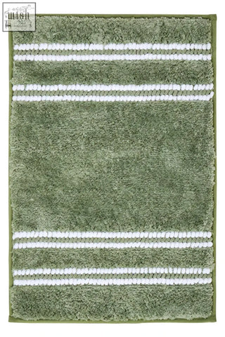 Sage green plush bath mat with three white woven stripes perfect for a cozy green bath mat setup